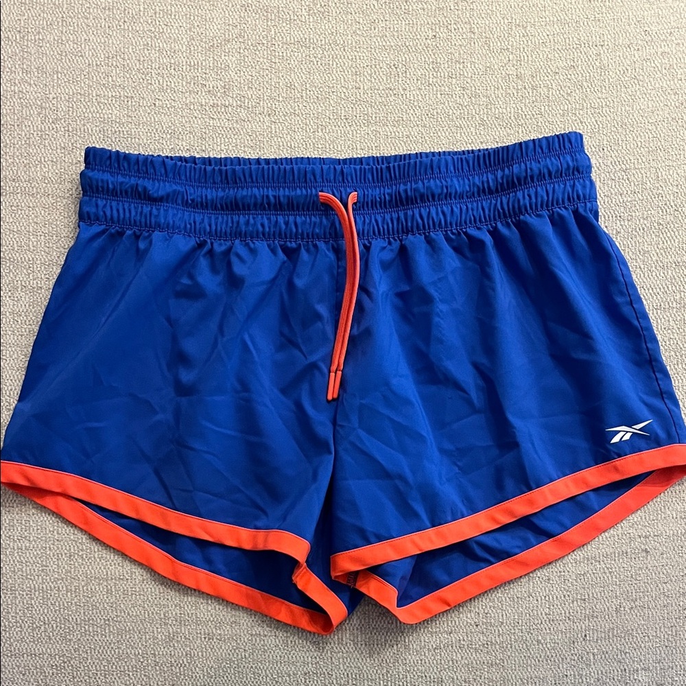 Reebok Women's Cobalt Blue Athletic Shorts with Orange Trim